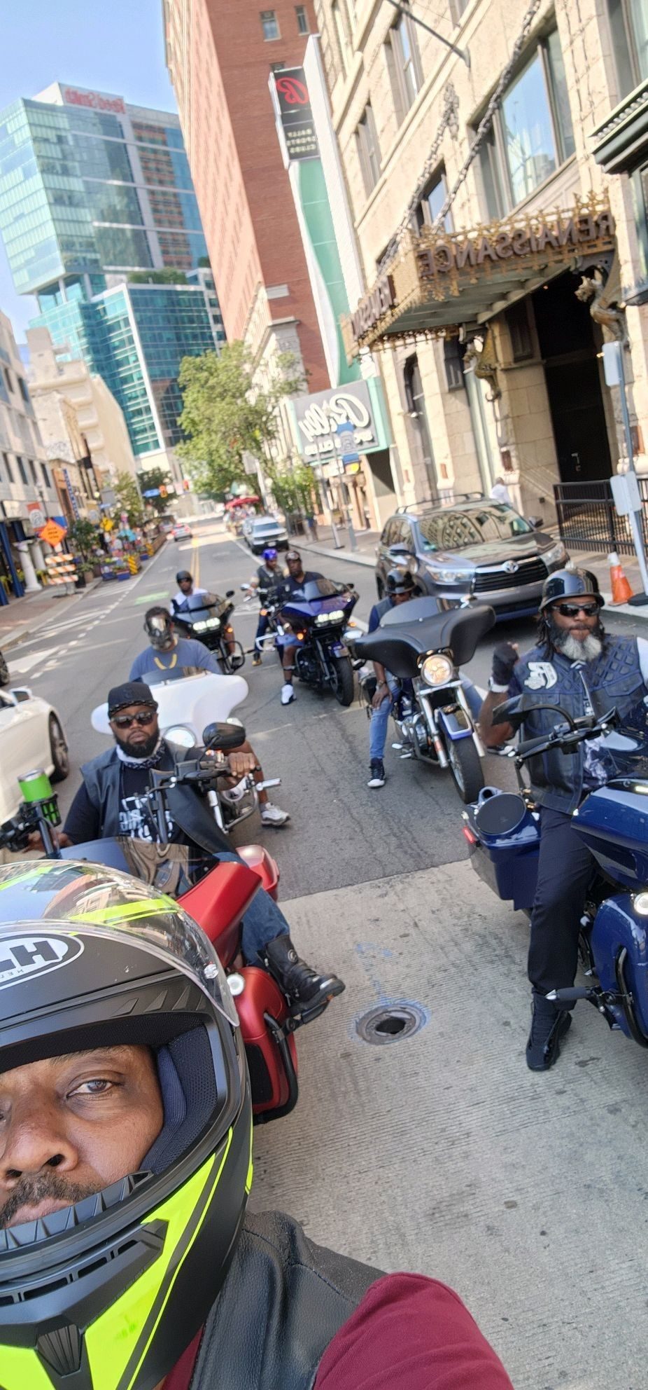 Riders lined up on motorcycles in downtown Pittsburgh